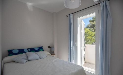 Postel nebo postele na pokoji v ubytování Casa el Jardin de Indalo - Mojacar Playa