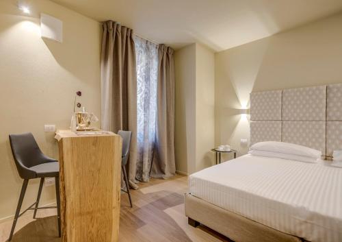 Hotel Borgo Imperoにあるベッド