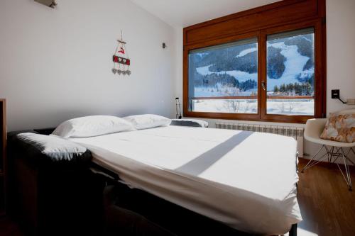 Postel nebo postele na pokoji v ubytování Apartaments Ashome