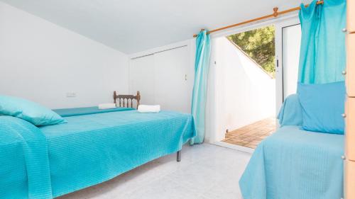 Postel nebo postele na pokoji v ubytování Atic Mar - Calella de Palafrugell