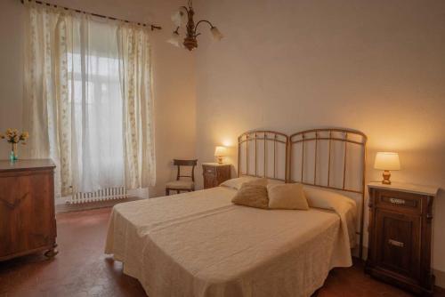 Ένα ή περισσότερα κρεβάτια σε δωμάτιο στο Agriturismo La Ripolina