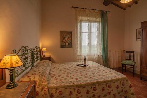 Ένα ή περισσότερα κρεβάτια σε δωμάτιο στο Agriturismo La Ripolina