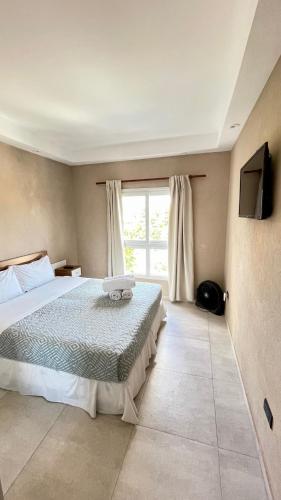 Katil atau katil-katil dalam bilik di Ayres Village Apart