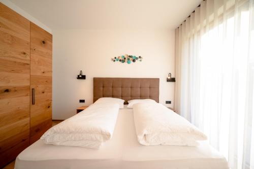 Llit o llits en una habitació de Garden Lodge