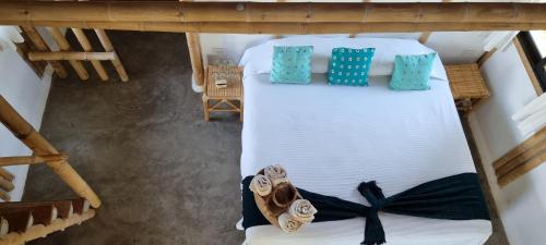 Postel nebo postele na pokoji v ubytování Hotel Taboga Eco Boutique & Spa Costa Esmeralda