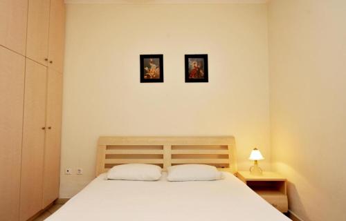 Posteľ alebo postele v izbe v ubytovaní Aiolos Home