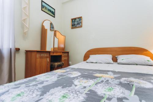 Postel nebo postele na pokoji v ubytování Проспект Шевченко Room