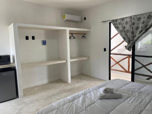 Cama o camas de una habitación en Kin studios holbox