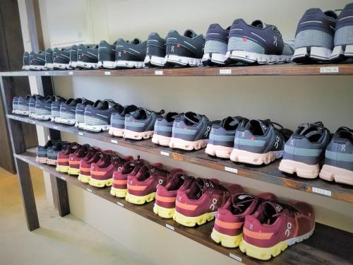 a row of shoes on shelves in a store at terrace IRIOMOTEJIMA CONDOMINIUM in Iriomote
