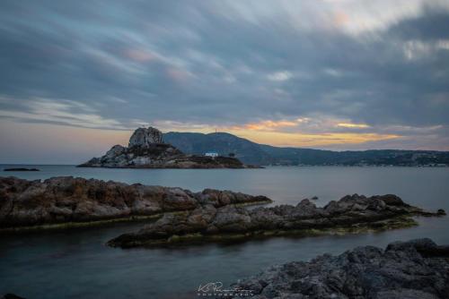 an island in the middle of a body of water at Paradise in Kefalos
