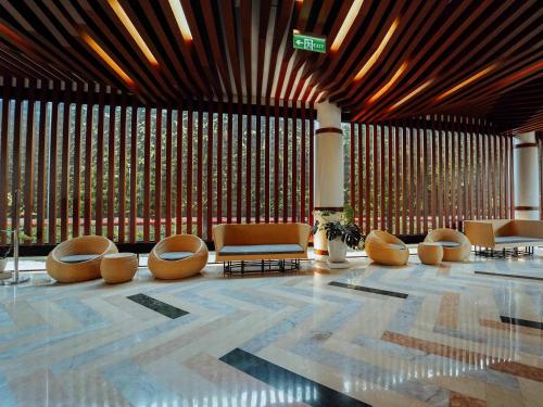 Un lugar para sentarse en Rayz UMM Hotel Malang
