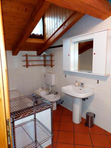 Et badeværelse på Appartamento Pieve