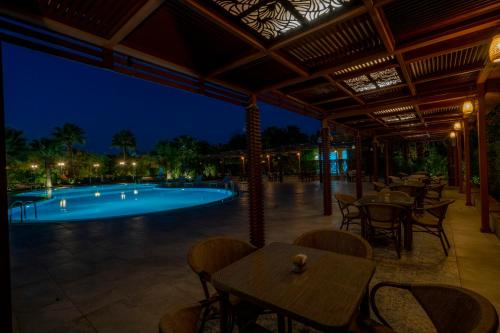 Πισίνα στο ή κοντά στο Laguna Vista Buraydah
