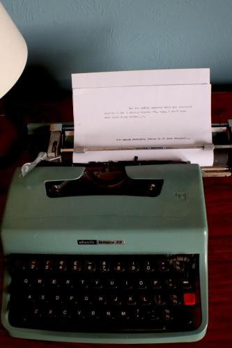 a envelope sitting on top of a computer keyboard at Grand top floor apartment in the Royal Bank House in Maybole