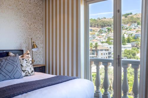 Ένα ή περισσότερα κρεβάτια σε δωμάτιο στο Cape Royale Luxury Apartments by Stay In Luxury