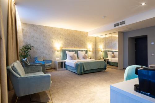 Ένα ή περισσότερα κρεβάτια σε δωμάτιο στο JOYME Hotel