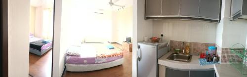 Η κουζίνα ή μικρή κουζίνα στο Caliph Suite Apartment Homestay Anjung Vista Kubang Kerian