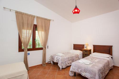 A bed or beds in a room at Casa Osala
