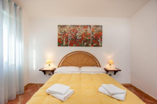 A bed or beds in a room at Casa Barvis