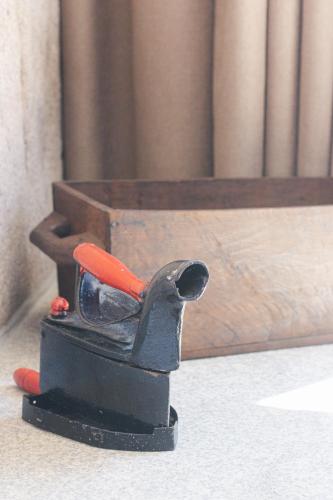 a black bird toy sitting on a table at Quinta de Fiães in Vilar de Maçada