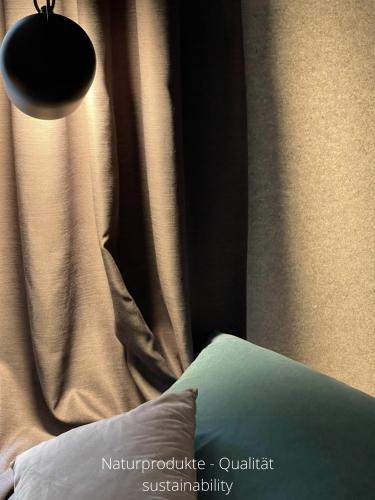 Cama ou camas em um quarto em Hotel Falkenturm