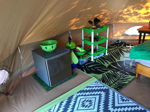 Кровать или кровати в номере Hluhluwe Bush Camp Glamping Village