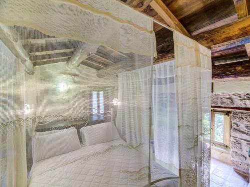 A bed or beds in a room at Belvilla by OYO Mulino