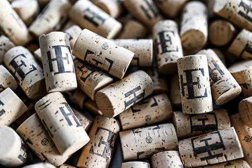 a pile of wine corks with the word wine written on them at Hotel Edison Poznań Lotnisko Ławica in Baranowo
