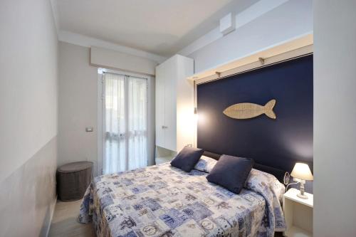 Postel nebo postele na pokoji v ubytování Victoria Apartments Acquarius