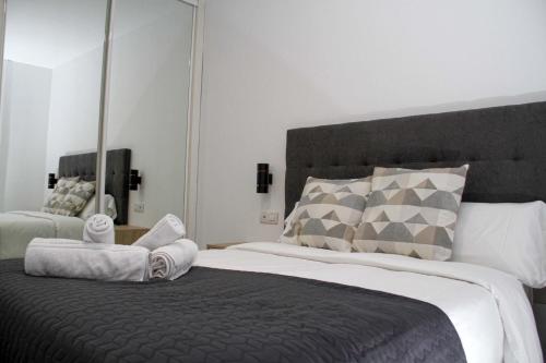 Un pat sau paturi într-o cameră la Guajara