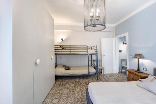 A bed or beds in a room at Victoria Apartments Maiolica