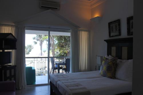 Katil atau katil-katil dalam bilik di Coco Ocean Resort & Spa