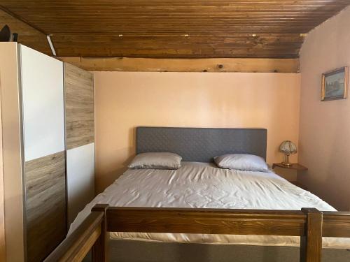 Postel nebo postele na pokoji v ubytování Holiday Home Dželalija