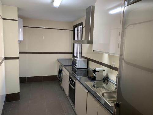 Η κουζίνα ή μικρή κουζίνα στο Apartment Lucena Center Atico Parking Gratis