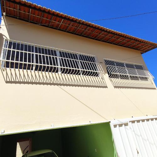 a house with solar panels on the side of it at Casa Germania in Canoa Quebrada
