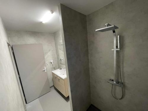 Koupelna v ubytování Hôtel MAAS