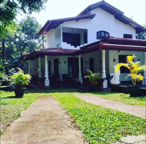 Un jardín fuera de VISU VILLA hotel