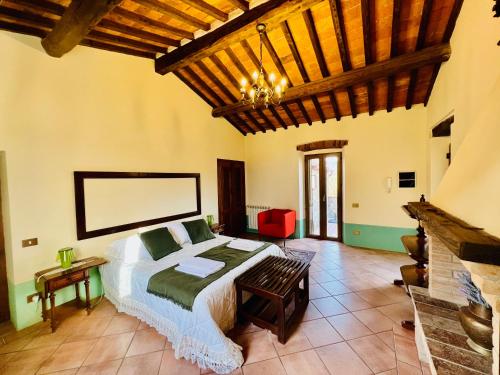 Postel nebo postele na pokoji v ubytování B&B VALLE D'ORO