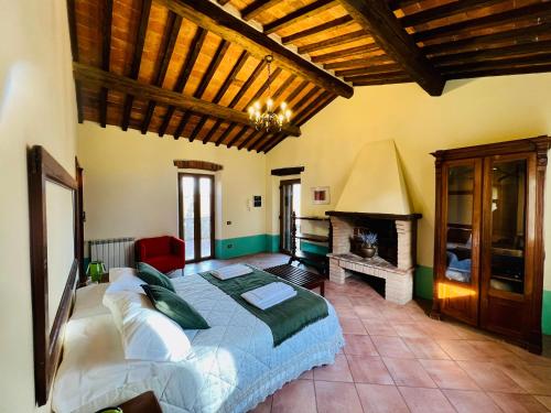 Postel nebo postele na pokoji v ubytování B&B VALLE D'ORO