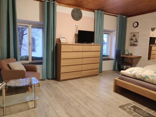 TV a/nebo společenská místnost v ubytování B&B Leonhard 7