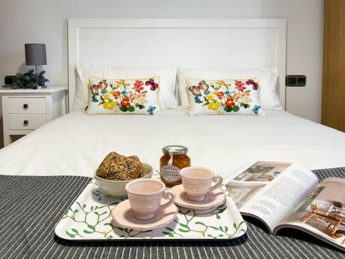 Llit o llits en una habitació de Apartamento con gran patio a 1 min de la playa