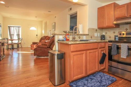 a kitchen with a sink and a counter top at Downtown Home with Grill 5 Mi to Garden of the Gods in Colorado Springs