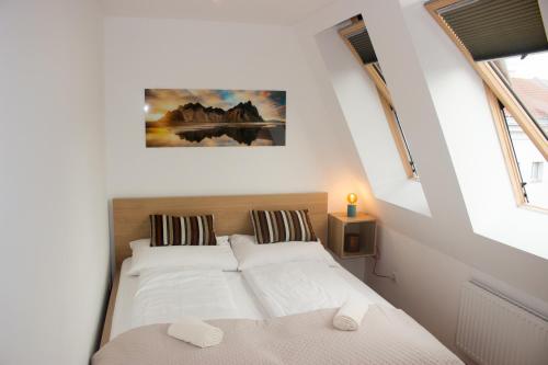 Postelja oz. postelje v sobi nastanitve Sunny & cozy Penthouse with Terrace DG3 QS12