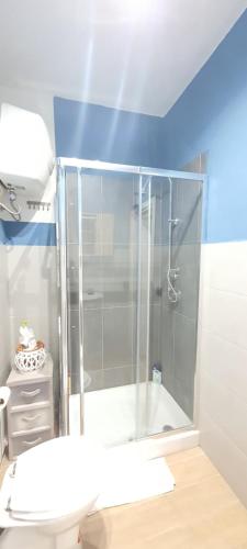 a shower with a glass door in a bathroom at Villa MiraMar Exclusive Home Palermo Airport in Carini
