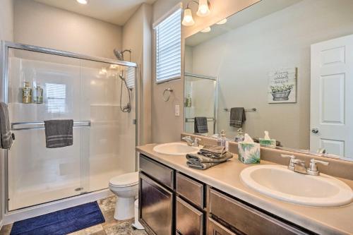 a bathroom with a sink and a shower and a toilet at Dreamy Windsor Home with Grill about 3 Miles to Lake! in Windsor