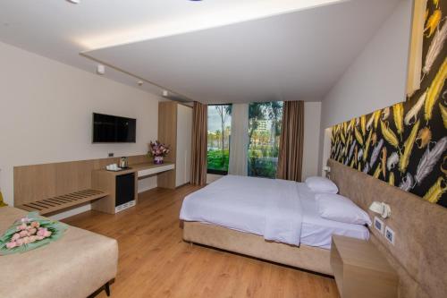Postel nebo postele na pokoji v ubytování Marina Premium Hotel & Apartments