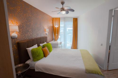 Katil atau katil-katil dalam bilik di Alpetri Apartments