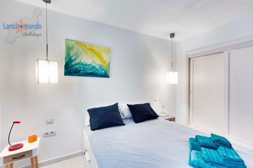 Postel nebo postele na pokoji v ubytování Vivienda Vacacional Sea Garden