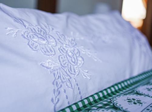 Postel nebo postele na pokoji v ubytování Mníchov dvor
