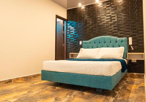 Letto o letti in una camera di Hotel Salinero - Zipaquirá